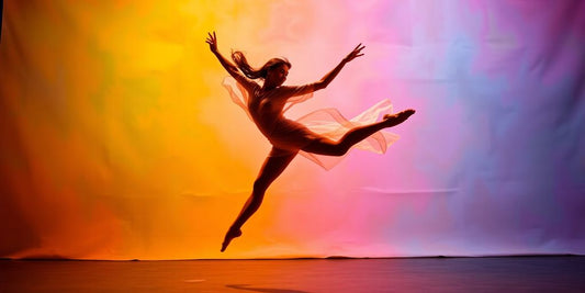Dancer in mid-air, showcasing grace and energy.